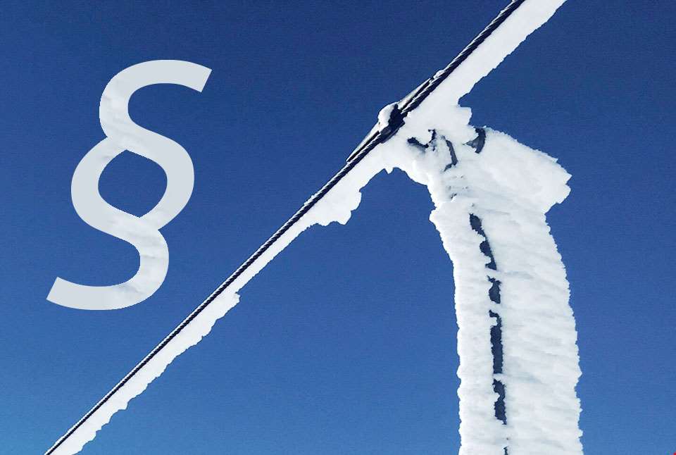 Ståltau og paragraftegn.